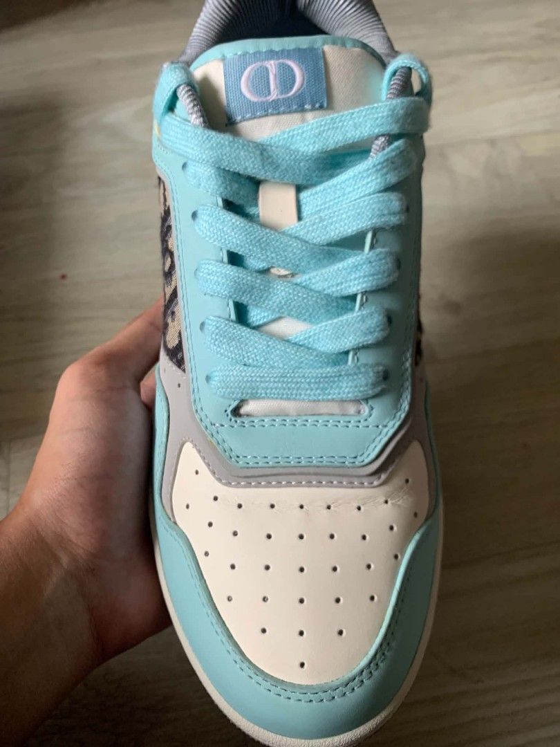 Dior B27 Low Top Sneakers (Category: Sneakers) located in Cainta. Submitted by zepseven7 (Listing ID 1463121196, Image 2). Description: - Dior B23 low top sneakers - Color: Light blue and beige - Features iconic Dior Oblique canvas - Comes with replacement box and ribbon - Made in Italy - Perfect addition to any sneaker collection - DM for the price.