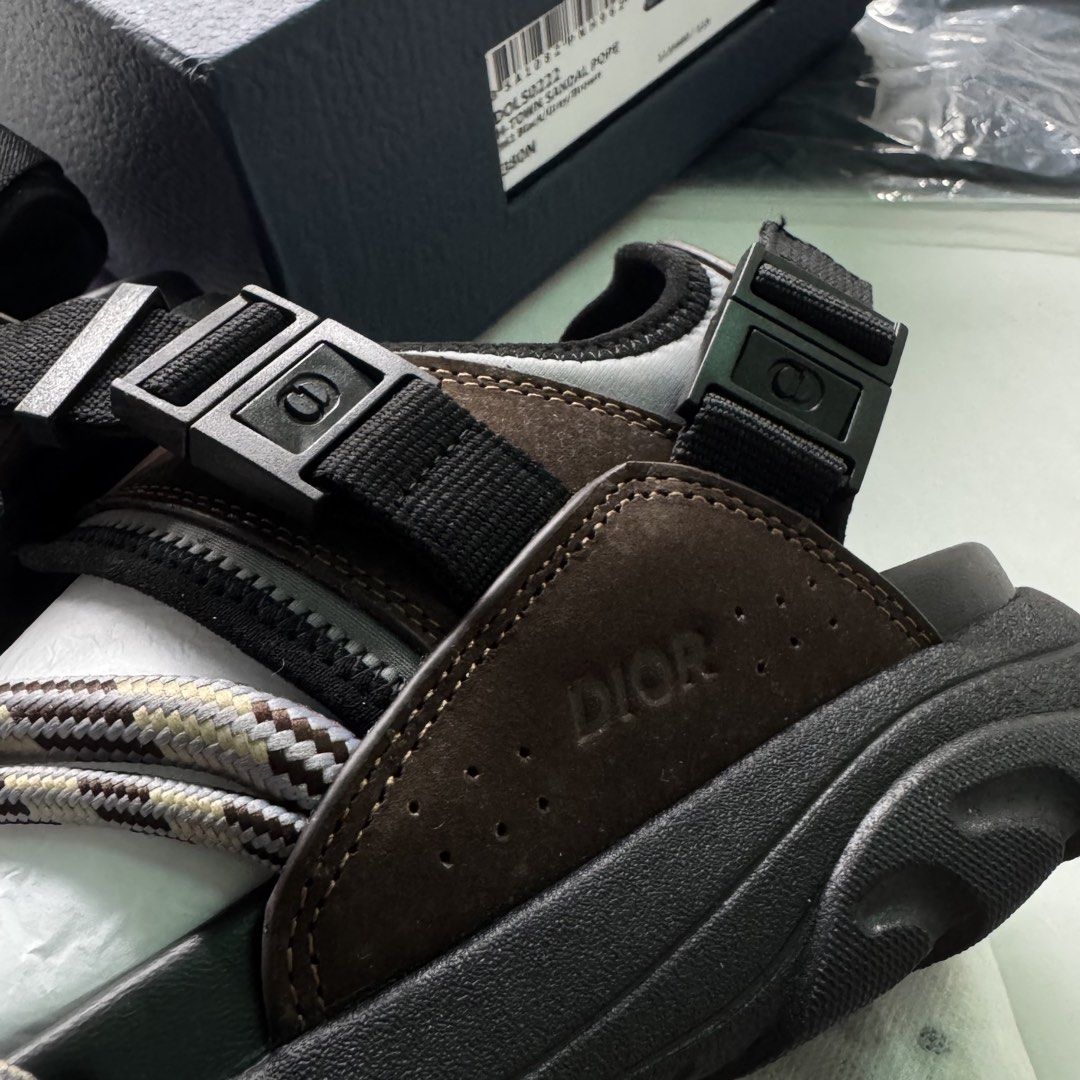Dior H-Town Sandals (Category: Slippers & Slides) located in Manila. Submitted by godspeedmnl (Listing ID 1463151091, Image 2). Description: Dior H-Town Sandals 6,589PHP / Sizes: 38, 39, 40, 41, 42, 43, 44, 45 Colorway: Black/Gray/Brown (Feel free to message me for additional photos.) Package included: • Dior H-Town Sandals x 1 • Godspeed Mnl Paper Bag • Godspeed Mnl logo & streetwear stickers. • Chance to be added to our GVIP list for exclusive 