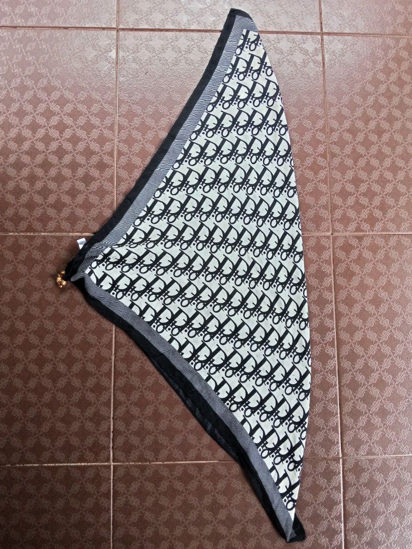 Dior Monogram Velvet Scarf (Category: Scarves) located in Davao. Submitted by carnopaul76938 (Listing ID 1463323222, Image 1). Description: - Elegant Dior monogram scarf - Classic black and white pattern - Luxurious velvet material - Subtle gold accent detail - Generous size: approximately 30 inches x 30 inches - Perfect accessory to elevate any outfit - Sourced from China.