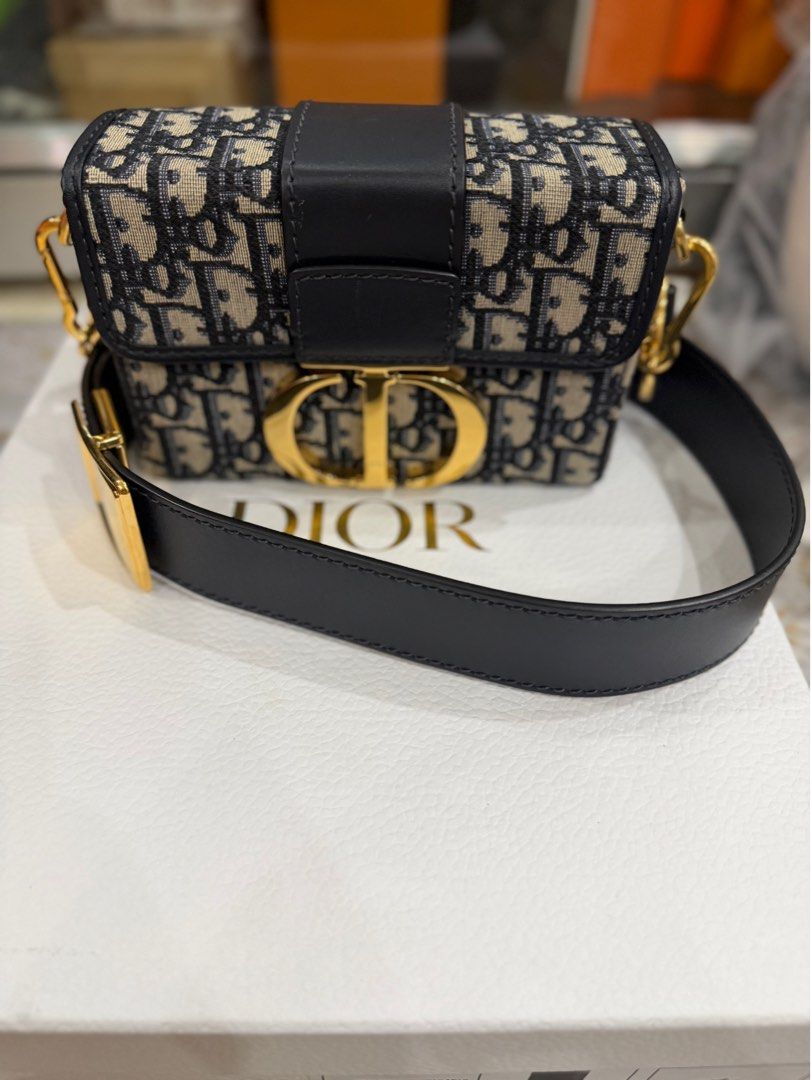 Dior Oblique Canvas Saddle Bag (Category: Luxury Bags & Wallets) located in Pasig City. Submitted by tamara0520 (Listing ID 1463258490, Image 1). Description: - Authentic Dior Saddle Bag - Classic Oblique Canvas - Black Leather Trim and Strap - Gold CD Buckle Closure - Includes Detachable Shoulder Strap - Versatile for everyday or special occasions - Authenticity Guaranteed.
