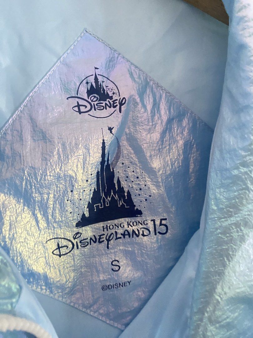Disney Cinderella windbreaker (Category: Coats, Jackets and Outerwear) located in Cainta. Submitted by grailfinders (Listing ID 1463196627, Image 3). Description: - Disneyland Hong Kong 15th Anniversary Windbreaker - Stunning iridescent blue color with subtle shimmer - Elasticated hem and cuffs for a comfortable fit - Size: S US - Ideal for theme park visits or casual wear - can fir medium to large asian.