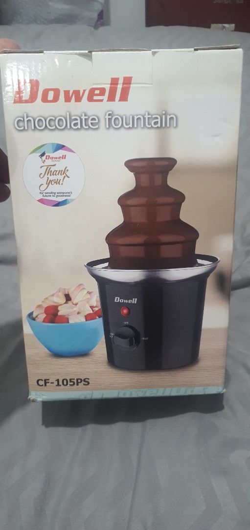 Dowell Chocolate Fountain CF-105PS (Category: Other Kitchenware & Tableware) located in Paranaque City. Submitted by personal_preloved40 (Listing ID 1463250984, Image 1). Description: - Dowell Chocolate Fountain, Model CF-105PS - 300ml capacity - 3-tier design for beautiful chocolate flow - Single switch controls both auger and heat - Heated base keeps chocolate perfectly melted - Easy to clean plastic body - Operates on 230V~60Hz, 60 Watts - Pri