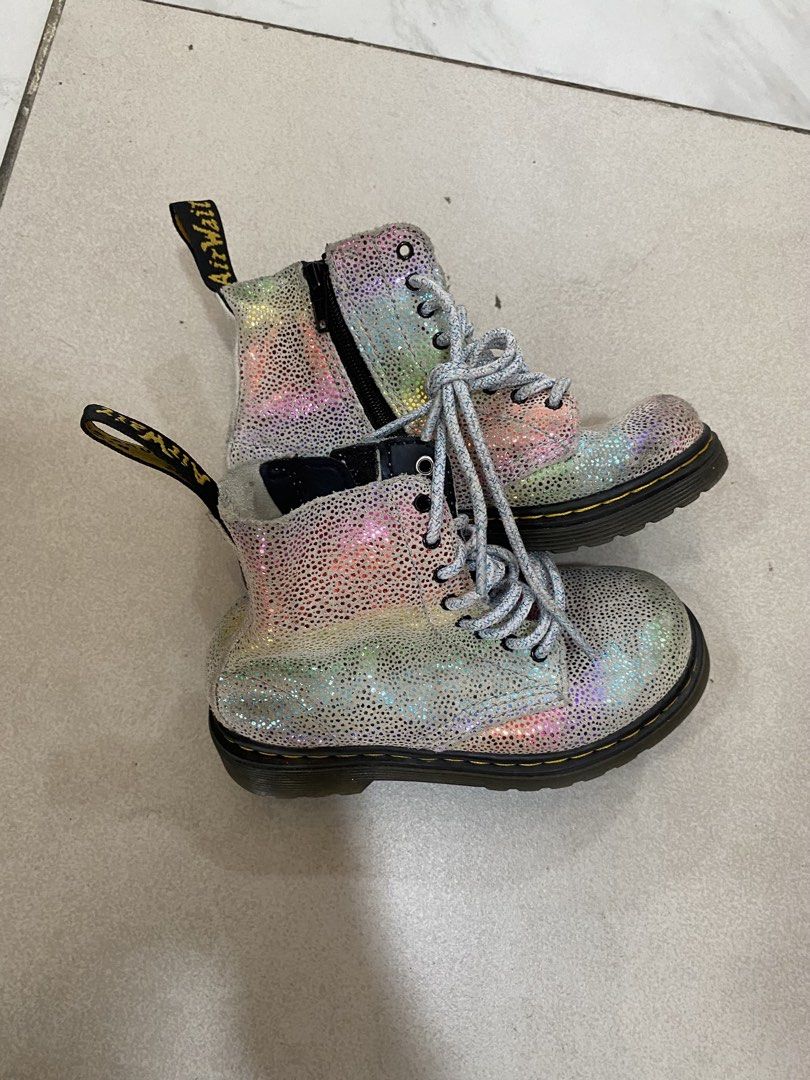 Dr. Martens 1460 Pascal Rainbow Glitter Boots (Category: Boots) located in Alburquerque. Submitted by zanegavynn43872 (Listing ID 1463129449, Image 1). Description: - Kids' Dr. Martens boots with a fun rainbow glitter effect. Size 6 months to 1 yr - Features both side zip and laces for easy wear. - Iconic yellow stitching and comfortable air-cushioned sole. - Perfect for everyday adventures..