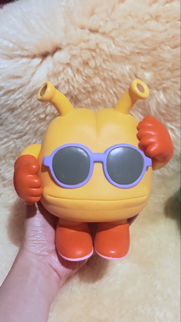 DR SLUMP (Category: Figurines & Statues) located in Baguio. Submitted by izza_thrifty (Listing ID 1463253320, Image 2). Description: - Adorable pair of monster figures. - Yellow monster: sunglasses, orange gloves, antennae, boots. - Green monster: purple gloves, big grin, antennae, boots. - Fun and quirky design. - Ideal for display or as a unique gift..