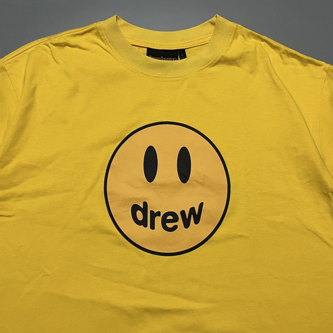 Drew House Mascot SS Tee Yellow (Category: Tshirts & Polo Shirts ) located in Las Pinas. Submitted by r4nd0m.thr1ft (Listing ID 1463283169, Image 2). Description: Drew House Mascot T-shirt — Large on tag 22.5 width x 29.5 length Very good condition, minimal scratch on print Price: 550+sf No reservations. First to pay ✌🏻 All items are thrifted/pre-loved, so please manage your expectations 🙇🏻 Color may vary due to lighting 📸.