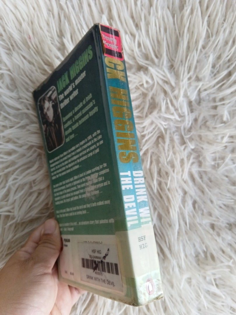 Drink with the Devil by Jack Higgins Paperback Thriller Novel (Category: Storybooks) located in Cavite. Submitted by nathstelein_finds (Listing ID 1463126237, Image 3). Description: - Jack Higgins thriller novel: 'Drink with the Devil' - Paperback edition - Gripping story of suspense and action - Pages are clean and readable - Spine shows some wear, but binding is intact - A classic from a master storyteller.