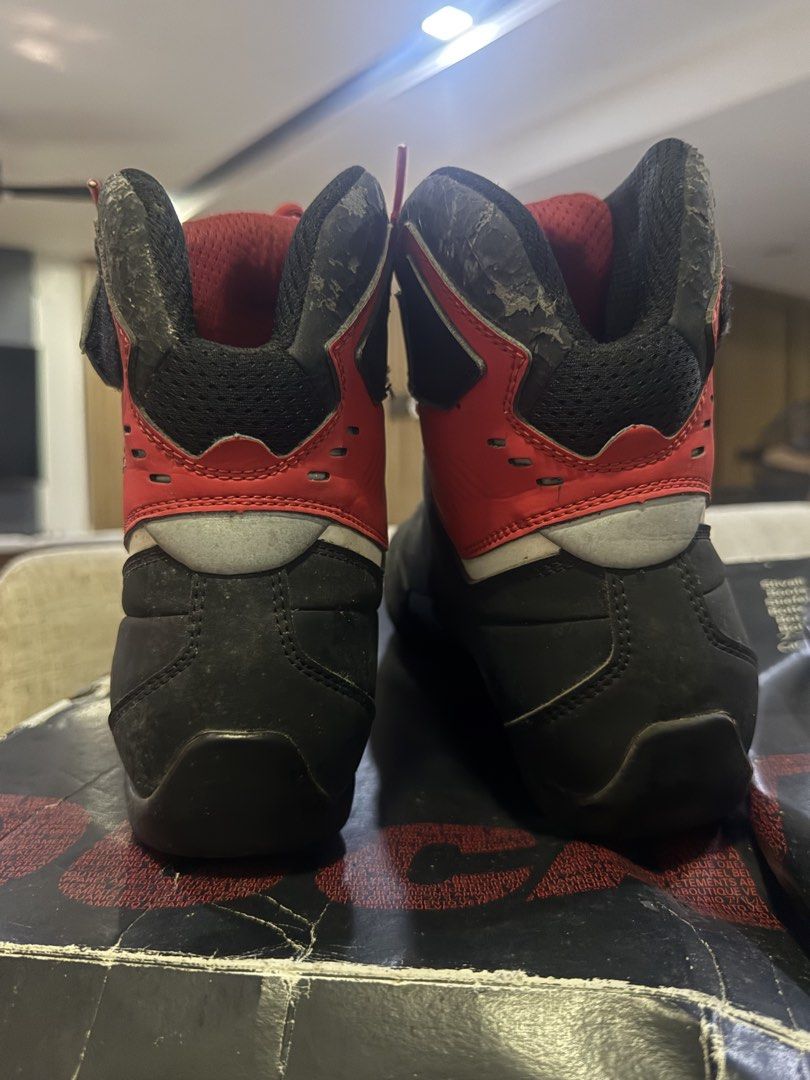Ducati Corse Motorcycle Riding Boots (Category: Boots) located in Manila. Submitted by jacobark1234 (Listing ID 1463170002, Image 3). Description: - Ducati Corse motorcycle boots - Color: Black and Red - Closure: Lace-up with velcro strap for secure fit - Condition: Exterior shows some scuffs and signs of wear; soles in decent shape - Includes original box (shows wear) - Ideal for track days or street riding.