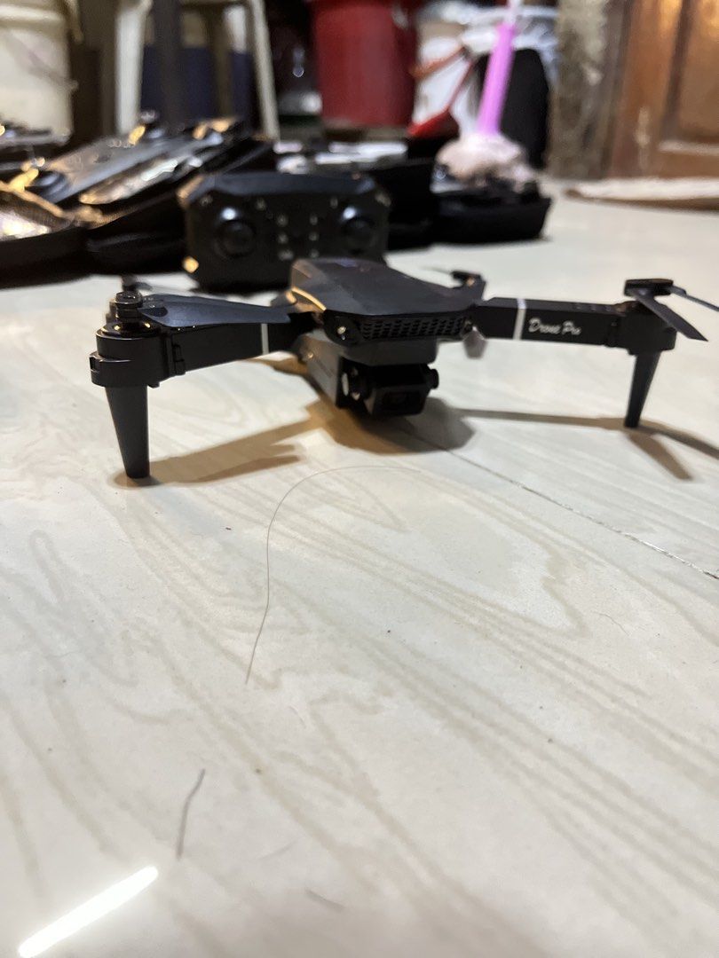 E88 Pro Drone with Camera and Remote Control (Category: Drones) located in Caloocan City. Submitted by hmr.gomez (Listing ID 1463128704, Image 1). Description: - E88 Pro Drones available - Choose from white or black colors - Comes with remote control - Includes a convenient carrying case - Ideal for aerial photography and videography - Ready for takeoff!.