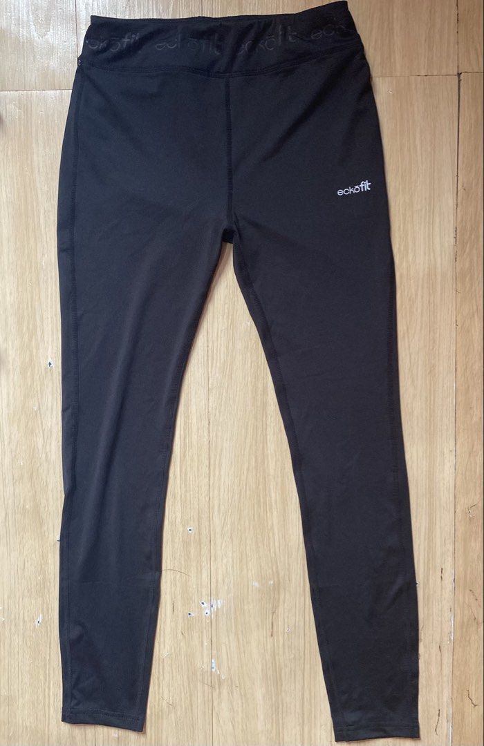 Eckōfit Black Athletic Leggings (Category: Activewear) located in Tanauan. Submitted by rie098 (Listing ID 1463291248, Image 1). Description: - Eckōfit black athletic leggings - Elastic waistband with repeating brand logo - Comfortable for workouts or casual wear - Good stretch for flexibility - Simple and functional design.