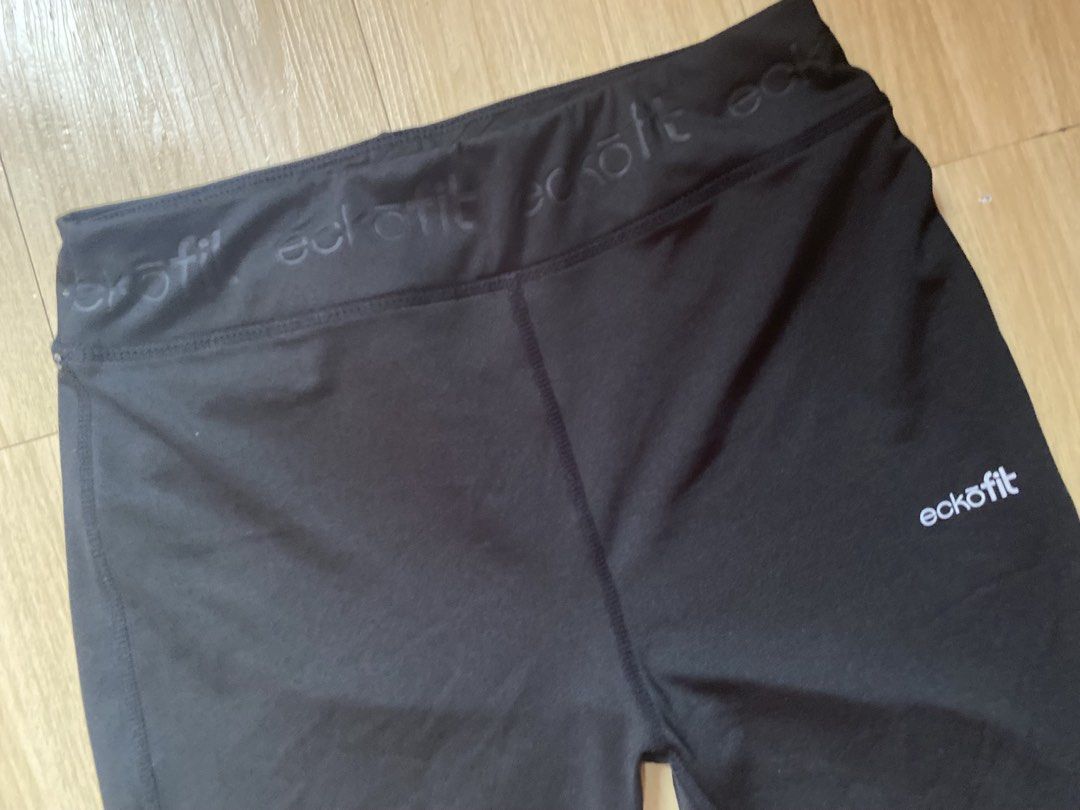 Eckōfit Black Athletic Leggings (Category: Activewear) located in Tanauan. Submitted by rie098 (Listing ID 1463291248, Image 2). Description: - Eckōfit black athletic leggings - Elastic waistband with repeating brand logo - Comfortable for workouts or casual wear - Good stretch for flexibility - Simple and functional design.