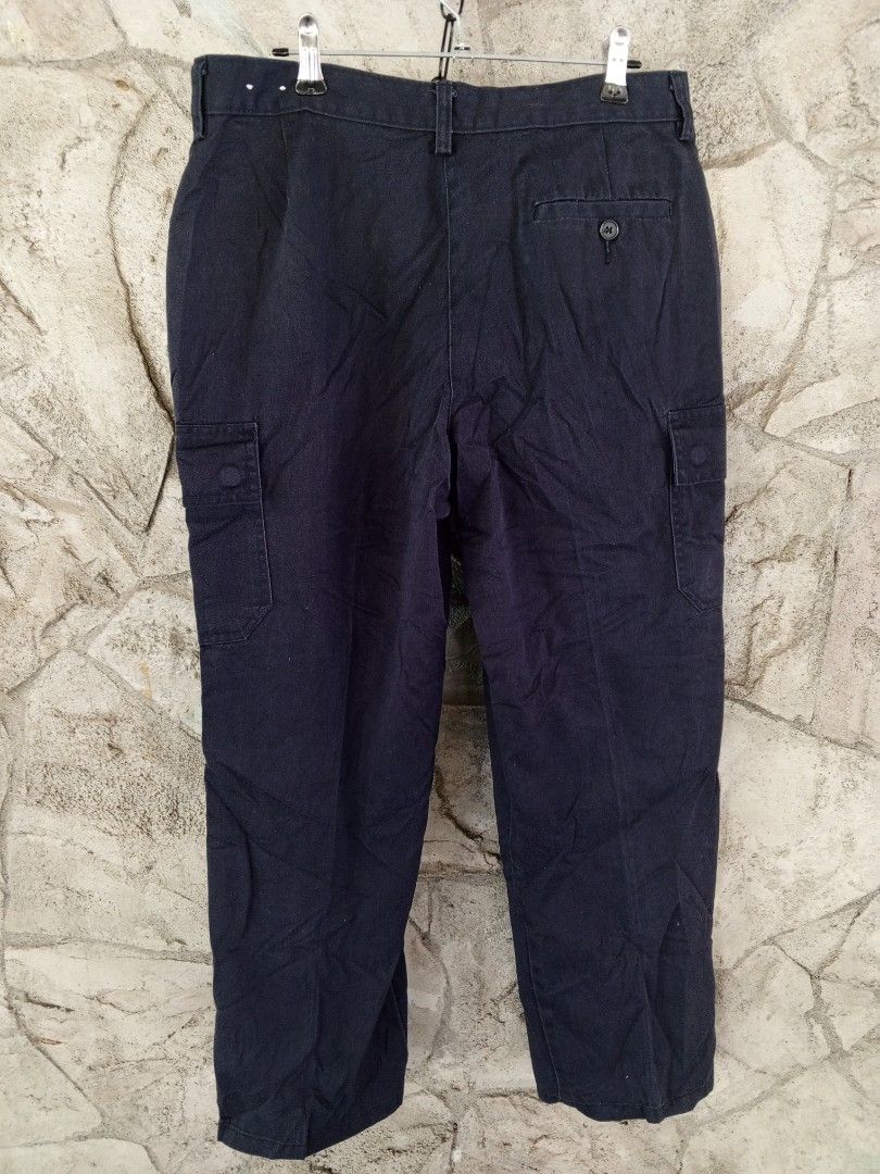 Edwards Navy Blue Cargo Pants (Category: Jeans) located in Orani. Submitted by thriftniea (Listing ID 1463203968, Image 2). Description: W30-31 L37 H9 - Navy blue Edwards cargo pants - Straight leg fit - Button and zip closure - Multiple front and side pockets - Ideal for casual wear or work - Comfortable and durable material.