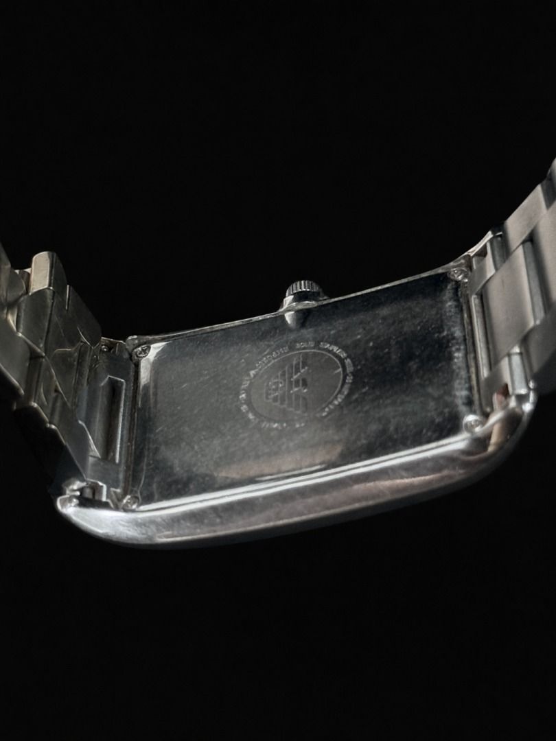 Emporio Armani Rectangular Black Dial Men's Watch (Category: Men's Watches) located in Caloocan City. Submitted by grandbear.ee4db0 (Listing ID 1463210073, Image 2). Description: EMPORIO ARMANI AR0156 ₱5,000 | Negotiable | Open for offers Specifications: • Collection: Classic • Movement: Quartz • Case: Stainless Steel, Rectangular • Case Size: Approx. 38 × 34 mm • Dial: Black with Roman Numerals • Features: Small Seconds Sub-Dial • Bracelet: Stai