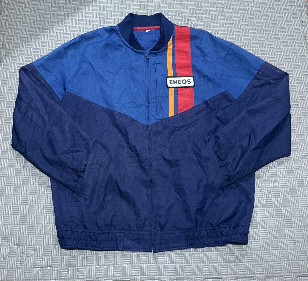 ENEOS Oi Gas Station Uniform (Category: Coats, Jackets and Outerwear) located in Baguio. Submitted by MysticVaultPh (Listing ID 1463292108, Image 1). Description: - Cool ENEOS jacket - Blue with red and yellow stripes - ENEOS logo patch on chest - Zip-up front - Elasticated cuffs and hem - Tiny pinhole on front (visible in last photo).