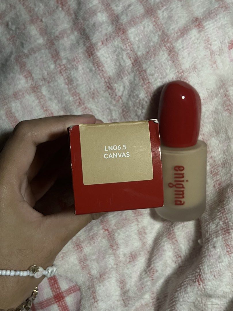 Enigma Foundation LN06.5 Canvas (Category: Makeup) located in Las Pinas. Submitted by yzzalouis (Listing ID 1463246673, Image 2). Description: - Enigma Foundation - Shade: LN06.5 Canvas - Packaging: Original red box, frosted glass bottle with red cap - Net Weight: 30ml - rfs: not my shade (too light).
