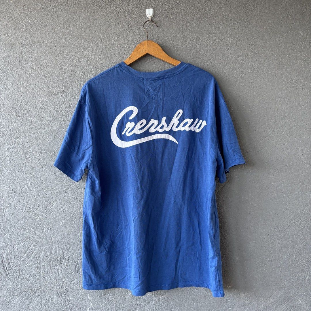 Essential tee (Category: Tshirts & Polo Shirts ) located in San Fernando. Submitted by diff.thr1ft (Listing ID 1463244111, Image 3). Description: - Brand: ESSENTIALS - Color: Blue - Material: 100% Cotton - Size: M on tag fit Large (L) - Front Design: ESSENTIALS FEAR OF GOD - Back Design: Gershaw - Condition: Good.