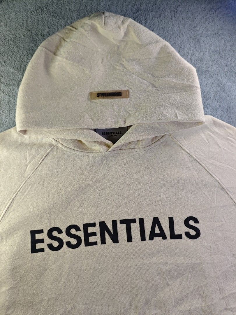Essentials Embossed Rubber Script Cream Pullover Hoodie (Category: Coats, Jackets and Outerwear) located in San Pedro. Submitted by chronothrift2ndacc (Listing ID 1463183555, Image 2). Description: - Size: Large Boxy (W25 x 26L) - Condition: 9/10 - Color Rate: 9.2/10 - Flaws: ❌❌❌ MOD: J&T Express / Lalamove / Meet MOP: Gcash / Bank Transfer.