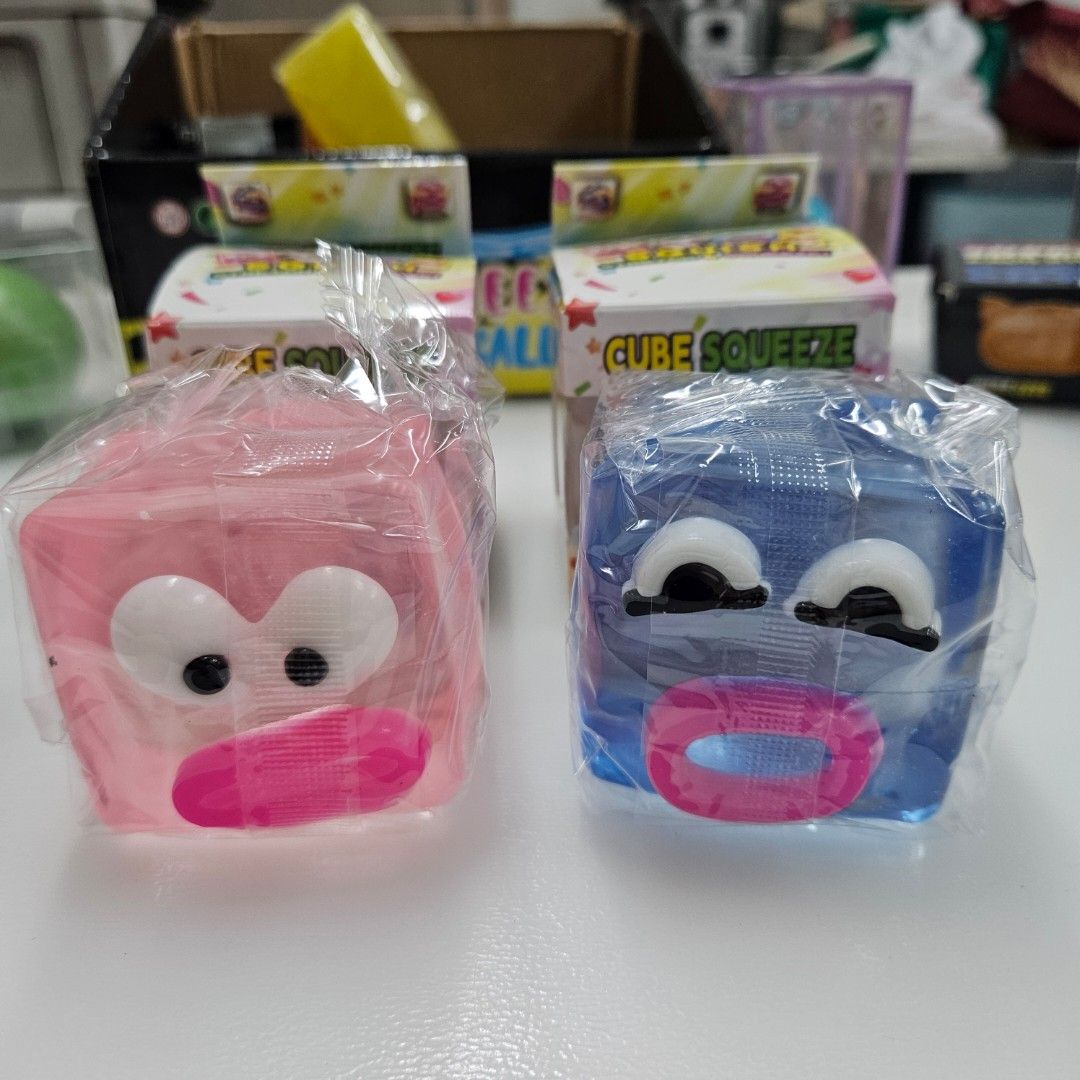 Face Cube Squeeze Squishy (Category: Designer & Blind Box Toys) located in Manila. Submitted by cam_c (Listing ID 1463142143, Image 1). Description: - Removable eyes and mouth - Sold per piece - Available in two cute colors: blue and pink. - Excellent for stress relief and playtime. - Each toy is individually wrapped with box.