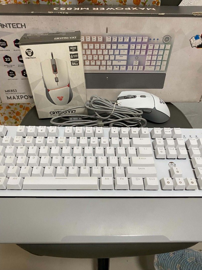 Fantech keyboard and mouse bundle (Category: Computer Keyboard) located in Quezon City. Submitted by lfrddd (Listing ID 1463216396, Image 1). Description: TAKE ALL - Fantech Maxpower MK853 mechanical keyboard (blue switch) - Fantech VX7 Crypto mouse Complete with boxes, manual, warranty cards, accessories, wrappers NO ISSUE! 100% PERFORMANCE.
