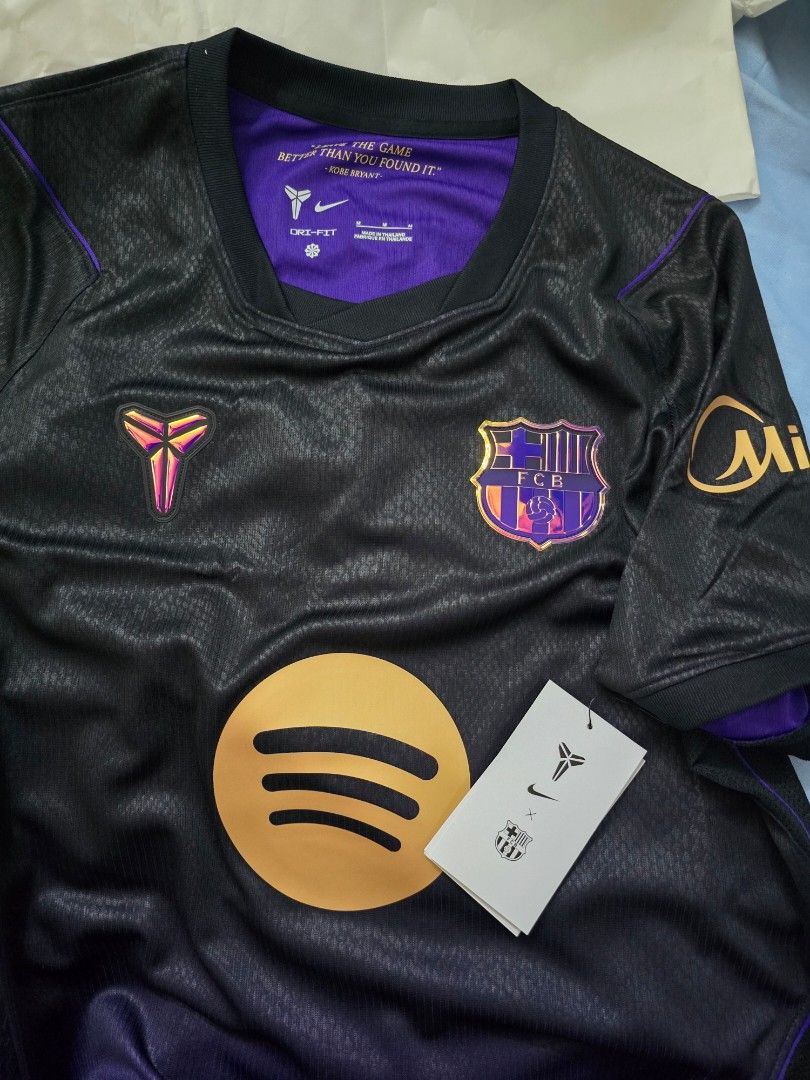 FC Barcelona x Kobe Bryant Nike Jersey (Category: Activewear) located in Makati City. Submitted by thegifted (Listing ID 1463294001, Image 2). Description: - Authentic FC Barcelona Jersey - Color: Black and Purple - Size: Medium (M); 21x29 - Features: Nike logo, FCB crest, Spotify logo, Kobe Bryant Mamba logo - Condition: Brand new with tags - Includes: Original packaging.