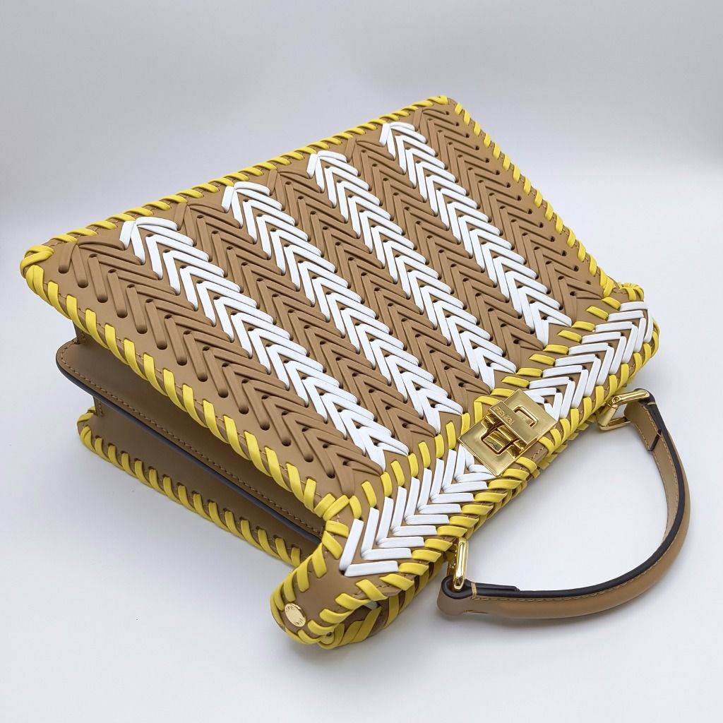 Fendi Peekaboo ISeeU Small Bag Interlace Taupe (Category: Luxury Bags & Wallets) located in Cebu City. Submitted by theluxxaffair (Listing ID 1463294451, Image 2). Description: Small Fendi Peekaboo ISeeU top handle bag in a striking taupe, white, and yellow chevron-style interlaced nappa leather with gold-tone hardware. Features intricate hand-woven detailing, signature twist-lock closure, structured top handle and detachable adjustable shoulder 
