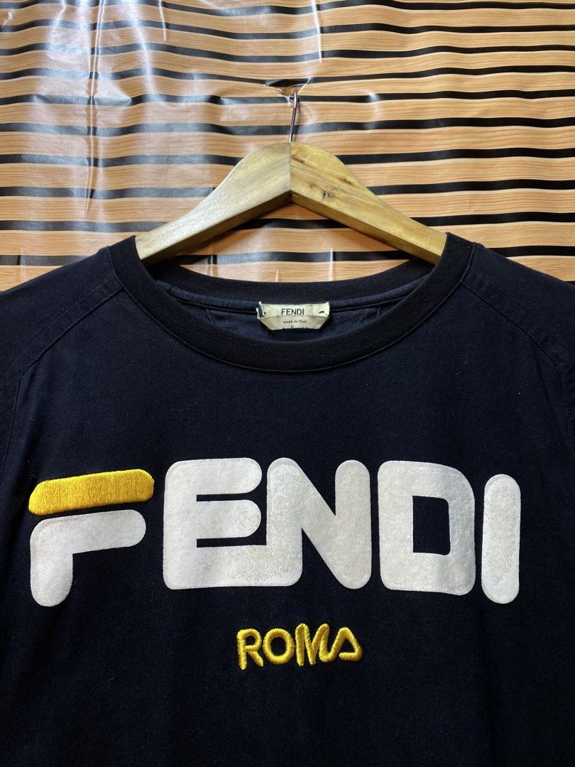 FENDI ROMA “SCRIPT” (Category: Shirts) located in Makati City. Submitted by drip.poww (Listing ID 1463291678, Image 3). Description: - Authentic Fendi - Color: Black - Size: Meduim - Dimes: 21x26 - Authentic - Excellent condition - Need wash, fresh from bale - Material: 100% Cotton Please don’t expect too much—these are thrifted (ukay) items. 😊 !!STILL NEGOTIABLE!!.