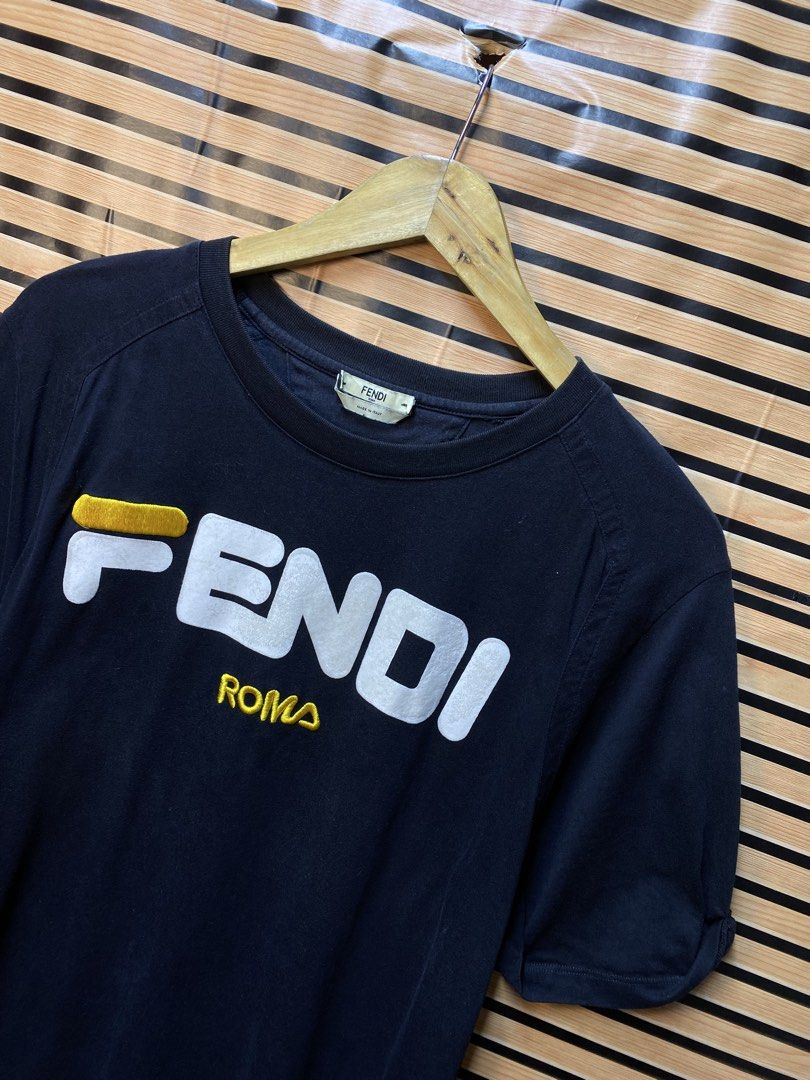 FENDI ROMA “SCRIPT” (Category: Shirts) located in Makati City. Submitted by drip.poww (Listing ID 1463291678, Image 2). Description: - Authentic Fendi - Color: Black - Size: Meduim - Dimes: 21x26 - Authentic - Excellent condition - Need wash, fresh from bale - Material: 100% Cotton Please don’t expect too much—these are thrifted (ukay) items. 😊 !!STILL NEGOTIABLE!!.