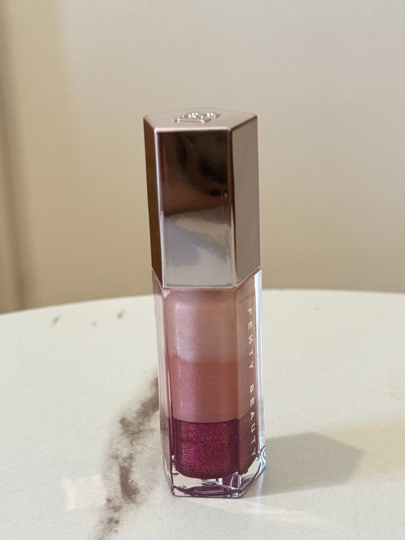 Fenty gloss bomb universal lip luminizer - Sugar Plumz (Category: Makeup) located in Quezon City. Submitted by quirksandcurls (Listing ID 1463323475, Image 2). Description: .