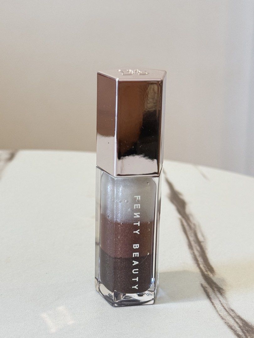 Fenty gloss bomb universal lip luminizer in Spiked hot chocolit (Category: Makeup) located in Quezon City. Submitted by quirksandcurls (Listing ID 1463323498, Image 1). Description: .