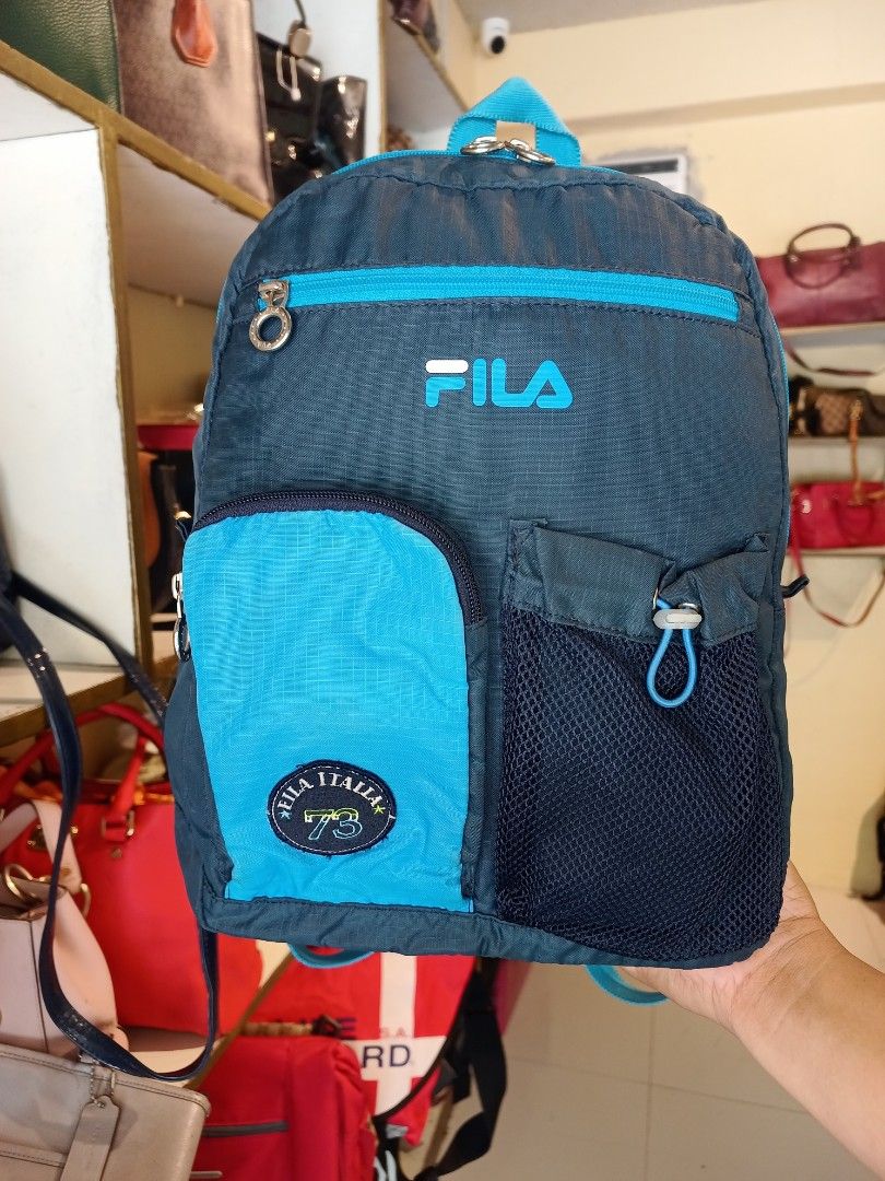 Fila backpack (Category: Backpacks) located in Tayasan. Submitted by mausherine57789 (Listing ID 1463192607, Image 1). Description: medium size school bag no major damage lightly used.