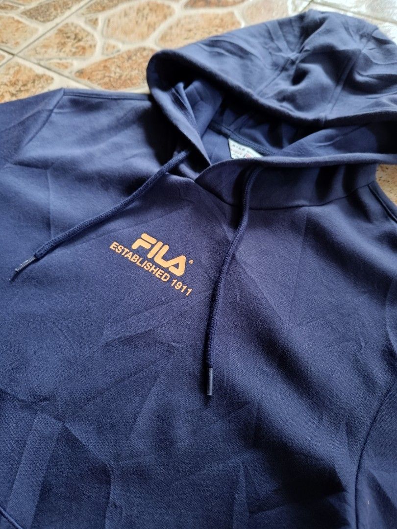 FILA HOODIE (Category: Coats, Jackets and Outerwear) located in Davao. Submitted by thrift.it.denzz (Listing ID 1463186544, Image 2). Description: FILA -SIZE LARGE W21.5 L26.5 -GOOD AS NEW CONDITION -500🏷️ ADD SHIPPING FEE 📩DM📩.