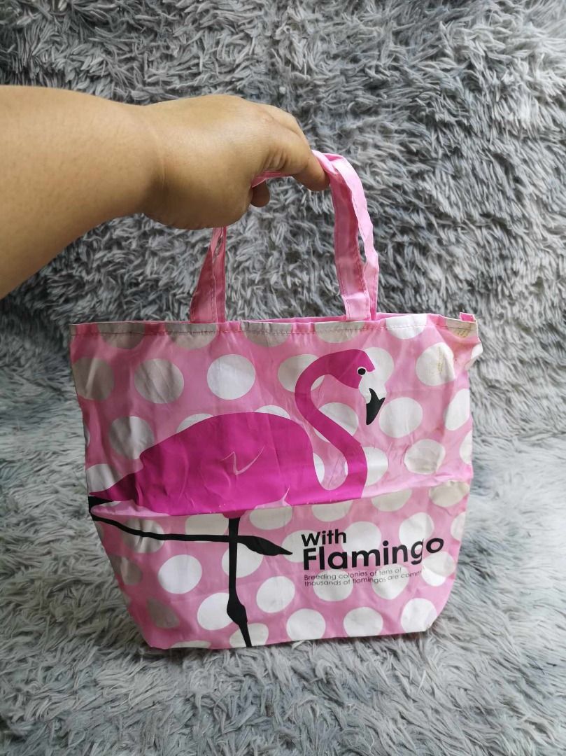 Flamingo Polka Dotted Reusable Tote Bag (Category: Tote Bags) located in Santa Cruz. Submitted by jmy_surplus.2 (Listing ID 1463245577, Image 3). Description: Size ; L - 13.2 W - 13.5 Color ; Pink Type ; Tote Bag Brand ; No brand Material ; Nylon Style ; Pink Polka Dotted Tote Bag LR 129 JMY 4 Batch #223.