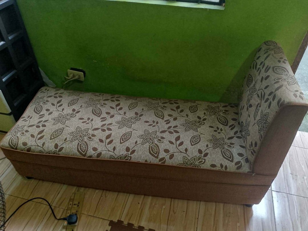 Floral Sofa Bed with Ottoman (Category: Sofas) located in Quezon City. Submitted by madelrivera (Listing ID 1463171780, Image 2). Description: - Versatile convertible sofa bed with a charming floral pattern. - Includes a matching ottoman for added functionality. - Easily transforms from a comfortable sofa to a cozy bed. - Made with durable fabric for long-lasting use. - Classic design complements any decor. - Ideal for maximizing space in apartme