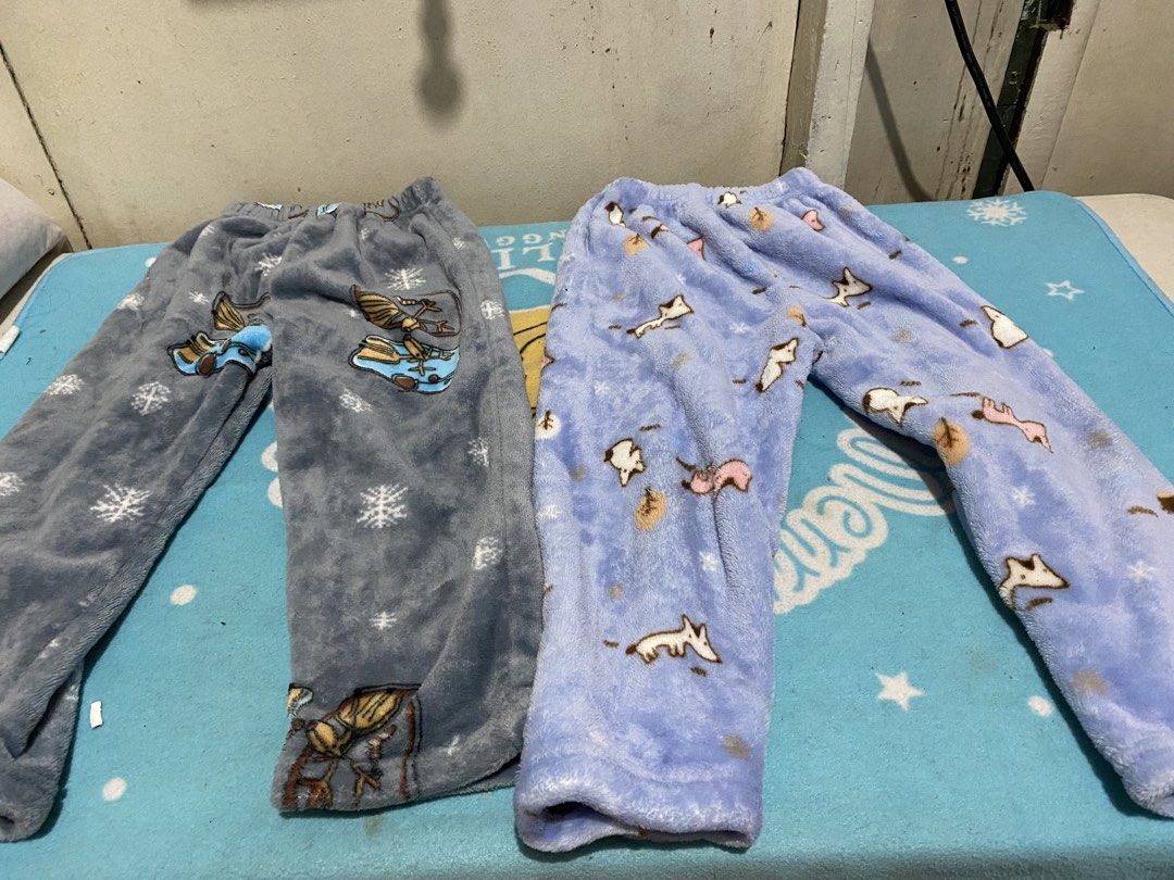 Fluffy Pajama Pants - Grey & Blue - Size S (Category: Babies & Kids Fashion) located in Manila. Submitted by resi.diaz (Listing ID 1463299355, Image 3). Description: - Super soft and fluffy pajama pants - Available in two designs: Grey with snowflake & character print, Light blue with cute animal print - Size: Small (S) 3-4 years - Features an elastic waistband for comfort - Ideal for lounging at home.