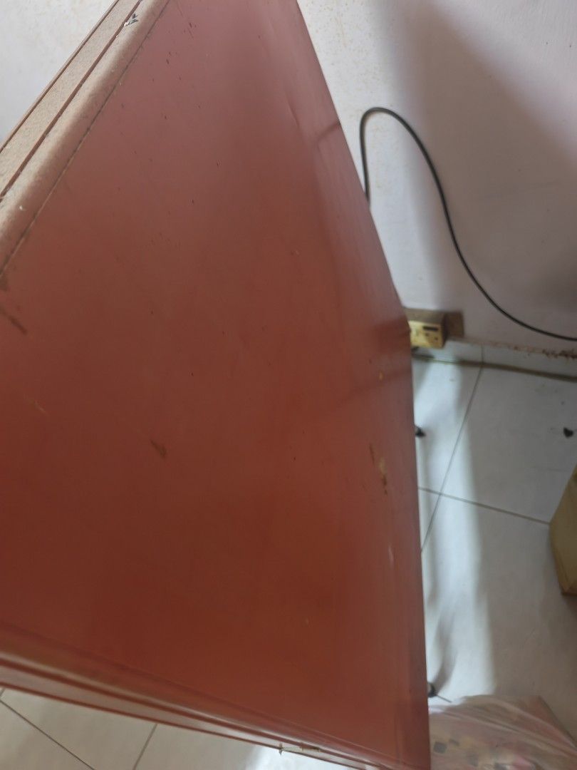 Foldable Table for Study or Dining (Category: Tables & Sets) located in Kuala Lumpur. Submitted by selllsecond18 (Listing ID 1463237494, Image 2). Description: - Foldable table, ideal for small spaces. - Versatile use: perfect for studying or dining. - Stylish reddish-brown surface. - Legs fold up for convenient storage. - A practical and space-saving furniture piece..