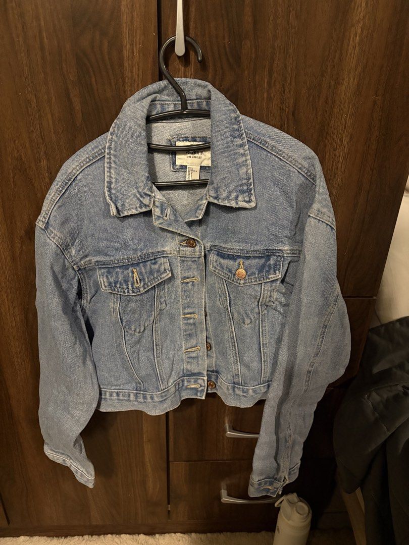 Forever 21 denim jacket (Category: Coats, Jackets and Outerwear) located in Bauang. Submitted by backburnerbyniki (Listing ID 1463244032, Image 1). Description: .