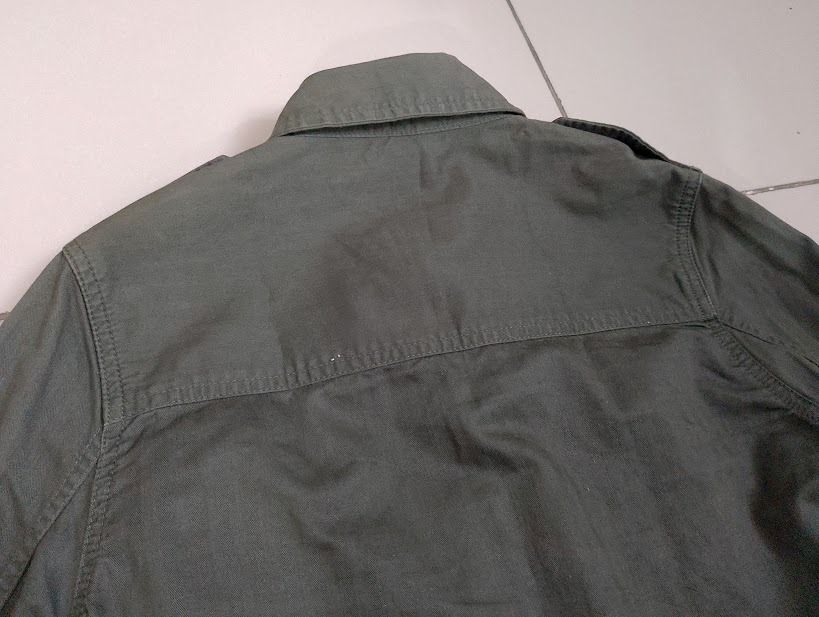 Forever 21 Olive Green Utility Jacket (Category: Coats, Jackets and Outerwear) located in Quezon City. Submitted by susmaryosep1 (Listing ID 1463255197, Image 1). Description: - Olive green utility jacket from Forever 21 - Size: S - Material: Cotton - Features: Button-up front, two chest pockets, two lower pockets, shoulder epaulets, button cuffs 400.