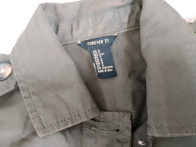 Forever 21 Olive Green Utility Jacket (Category: Coats, Jackets and Outerwear) located in Quezon City. Submitted by susmaryosep1 (Listing ID 1463255197, Image 3). Description: - Olive green utility jacket from Forever 21 - Size: S - Material: Cotton - Features: Button-up front, two chest pockets, two lower pockets, shoulder epaulets, button cuffs 400.