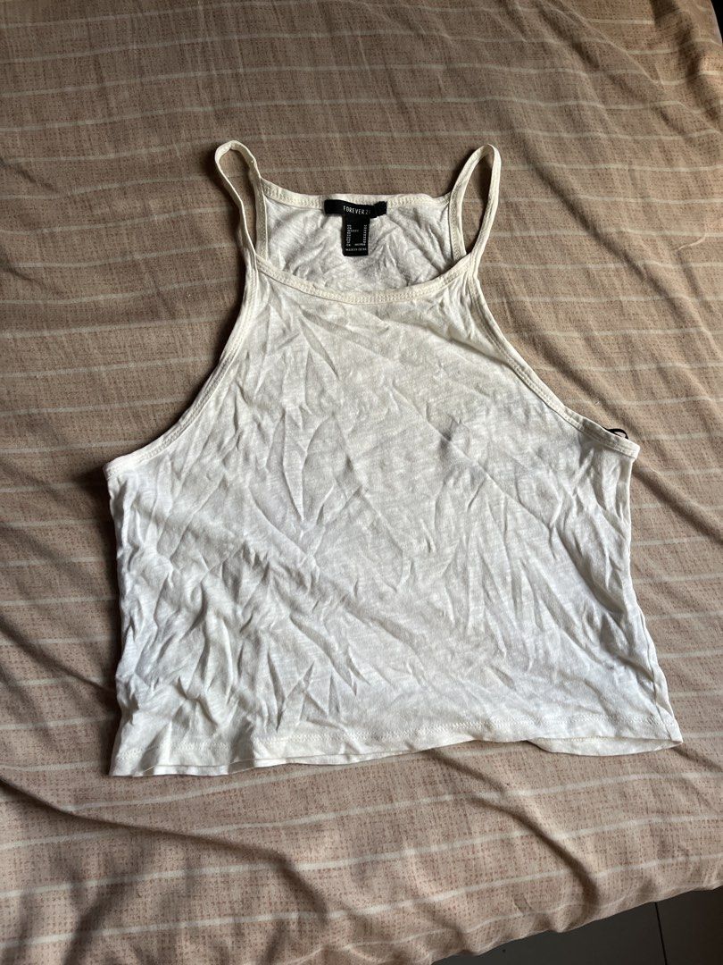 forever 21 white halter top (Category: Sleeveless) located in Quezon City. Submitted by sullenangel (Listing ID 1463198875, Image 1). Description: .