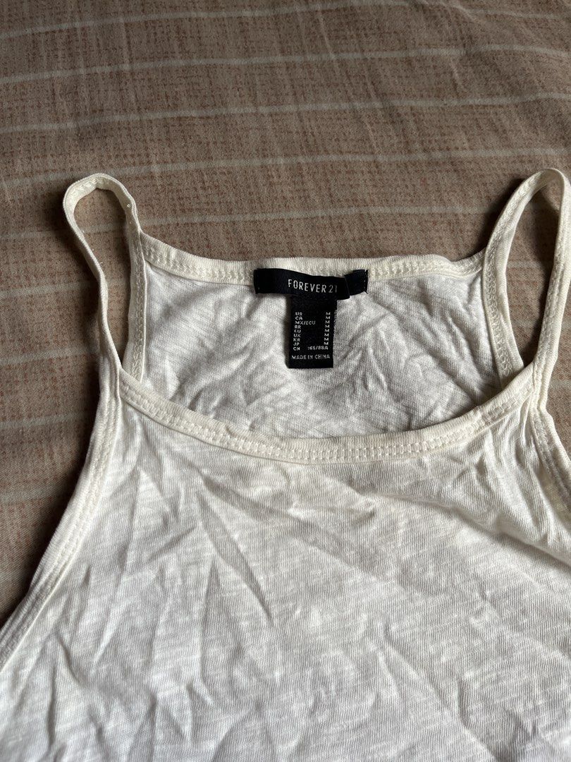 forever 21 white halter top (Category: Sleeveless) located in Quezon City. Submitted by sullenangel (Listing ID 1463198875, Image 2). Description: .