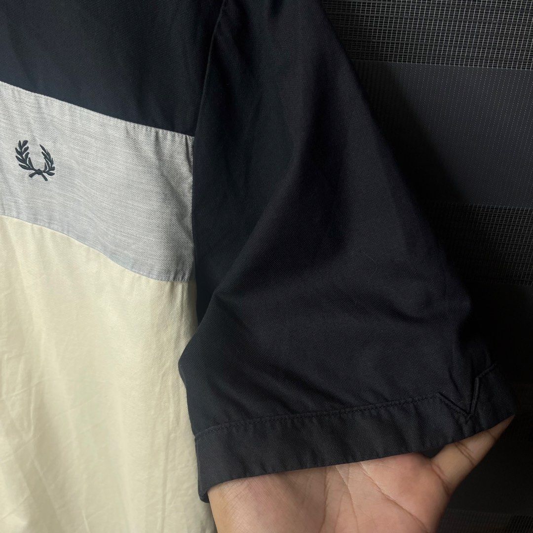 Fred Perry Panel Design - Tri-tone Color (Category: Tshirts & Polo Shirts ) located in Pasig City. Submitted by good_finds.ph26 (Listing ID 1463237868, Image 3). Description: Fred Perry Tri-tone Color - Size XLarge Width : 24 Length : 29 ( front ) - 30 ( back ) - Black,Grey,Off White ( 10/10 Colorate ) ✨ Complete : Bottons Issue ❌ - Authentic ✔️ - Excellent Condition ✨ 📩📩📩.