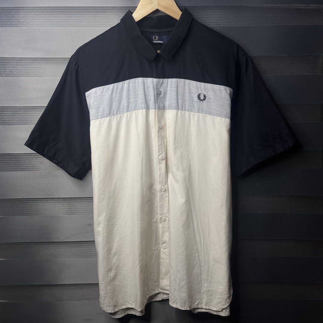 Fred Perry Panel Design - Tri-tone Color (Category: Tshirts & Polo Shirts ) located in Pasig City. Submitted by good_finds.ph26 (Listing ID 1463237868, Image 1). Description: Fred Perry Tri-tone Color - Size XLarge Width : 24 Length : 29 ( front ) - 30 ( back ) - Black,Grey,Off White ( 10/10 Colorate ) ✨ Complete : Bottons Issue ❌ - Authentic ✔️ - Excellent Condition ✨ 📩📩📩.