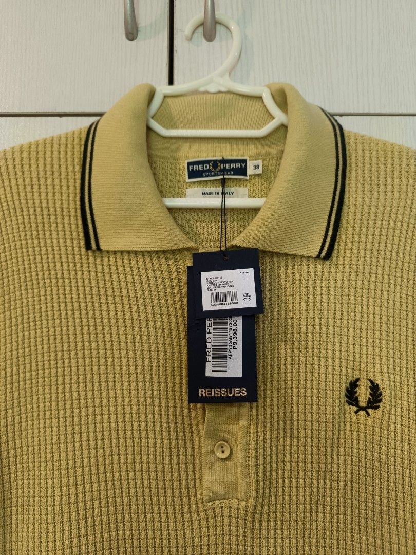 Fred Perry Reissues 1964 italy (Category: Tshirts & Polo Shirts ) located in Cebu City. Submitted by beagles30 (Listing ID 1463130136, Image 2). Description: Fred Perry Reissues 1964 yellow gold color made in italy with hangtags bought from store 9400+ bnew price fits M-L size 38 2,500 pesos negotiable.
