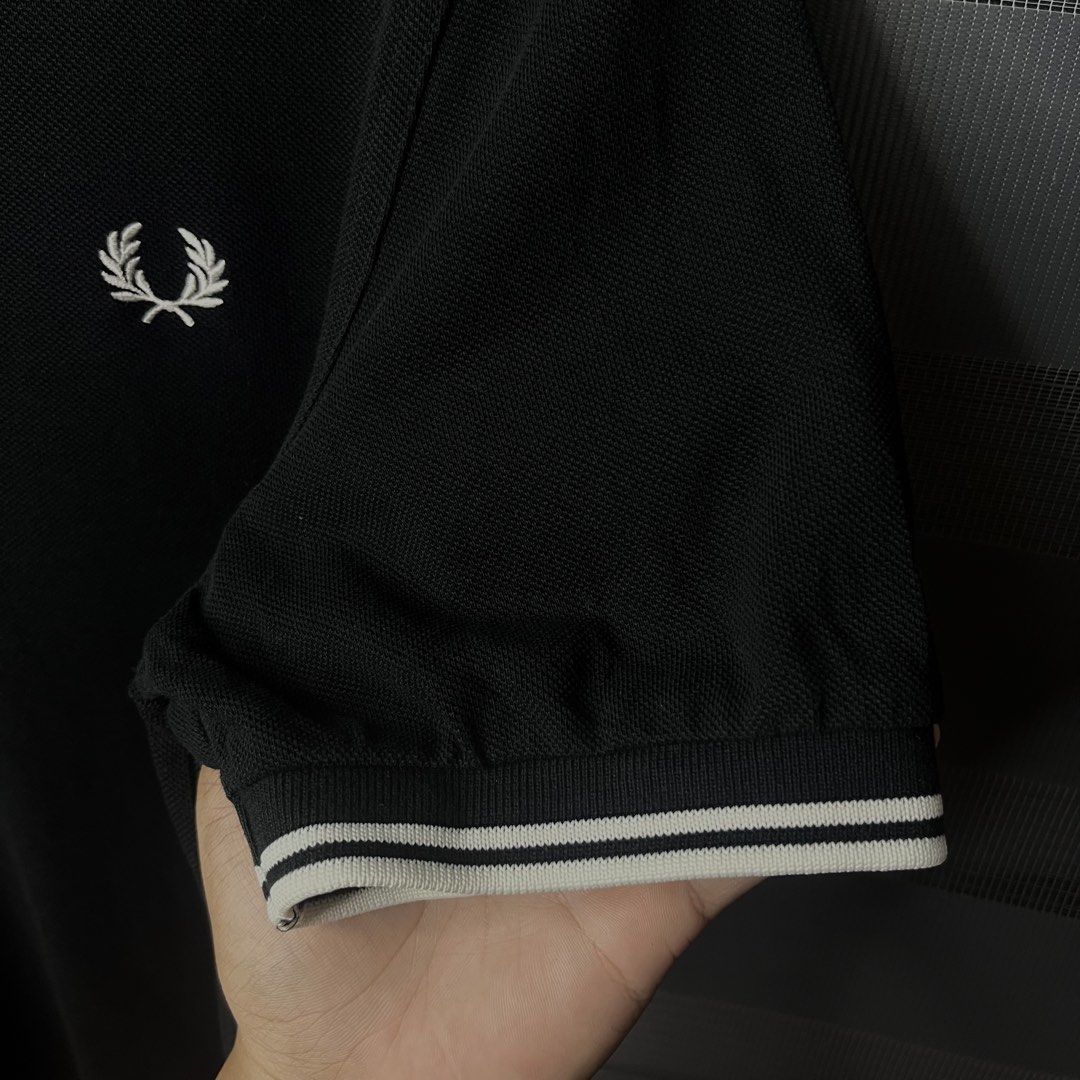 Fred Perry Tipped - Polo Shirt (Category: Tshirts & Polo Shirts ) located in Pasig City. Submitted by good_finds.ph26 (Listing ID 1463236978, Image 3). Description: Fred Perry Twin Tipped Polo Shirt - Size Medium Width : 20.5 Length : 29 - Black ( 10/10 Colorate ) ✨ Issue ❌ - Authentic ✔️ - Like New Condition ✨ 📩📩📩.