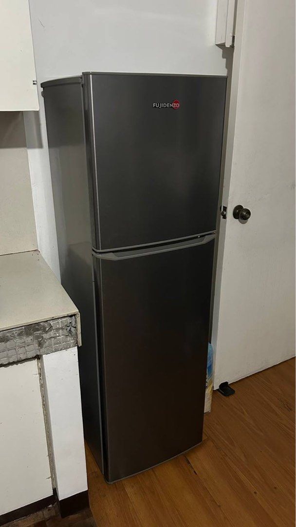 Fujidenzo 7 cu. Ft. Two-Door Refrigerator (Category: Refrigerators and Freezers) located in Quezon City. Submitted by nikabanika (Listing ID 1463244149, Image 2). Description: - Fujidenzo two-door refrigerator - Color: Dark Grey - Condition: Works well - Ideal for: Small families or couples - Features: Plenty of interior space for groceries - Reason for Selling: Moving - Pickup: Buyer to arrange pickup.