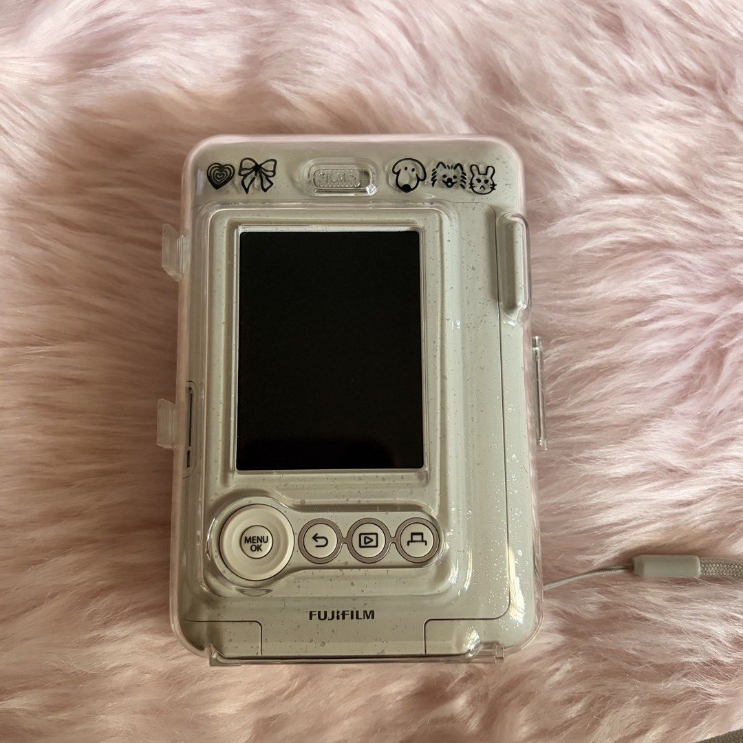 Fujifilm Instax Mini LiPlay Instant Camera (Category: Cameras) located in Rodriguez. Submitted by l0uvjk (Listing ID 1463184037, Image 2). Description: Instax Mini LiPlay — Misty White 🦢 — this is a hybrid camera. search before transacting! — with protective case, strap, orig box, and 16 gb sd card — with free (6) instax film inside. ready to use & snap! — no dents, scratches. lady owned — crisp buttons, perfectly working flash, no screen and sp