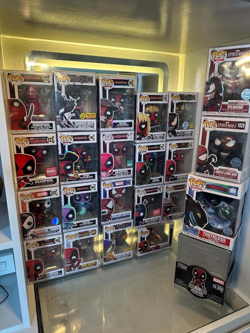 Funko Pop Marvel & DC Figures - Deadpool, Venom, Groot, Toothless (Category: Figurines & Statues) located in Pasig City. Submitted by lilacdreamz (Listing ID 1463228483, Image 1). Description: - Funko Pop Collection for Sale! - Featuring various Deadpool designs: Dinopool, Kidpool, and more. - Includes popular characters: Venomized Groot, Venom, Spider-Man, and Toothless. - Some figures are exclusive editions. - All items are brand new and in the