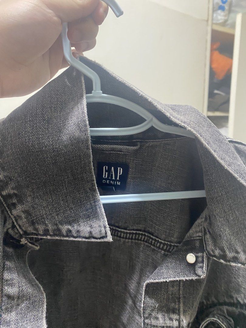 GAP Denim Jacket - Grey Wash (Category: Coats, Jackets and Outerwear) located in Rizal. Submitted by 88iggy (Listing ID 1463279339, Image 3). Description: - Classic grey wash denim jacket from GAP - Button-up front - Two chest pockets - Versatile for layering over tees or hoodies - Ideal for casual outings.