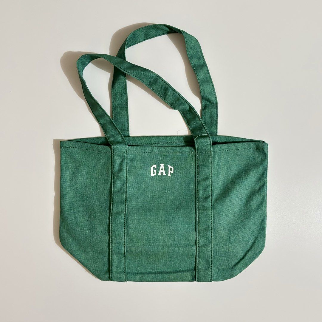 GAP Logo Tote Bags (Category: Tote Bags) located in General Trias. Submitted by upperlaneph (Listing ID 1463135310, Image 2). Description: Mini GAP Logo Tote Bags Dimension (inches): 10” H × 6” W × 10” L Price: ₱1,500 each Available Colorways: • Spring Yellow • Off-White • Algae Green • Summer Purple Plum • Modern Red ✅ 100% Brand New & Authentic (Bought from Canada) We offer same-day delivery via Lalamove and nationwide shipping via J&T and LBC.