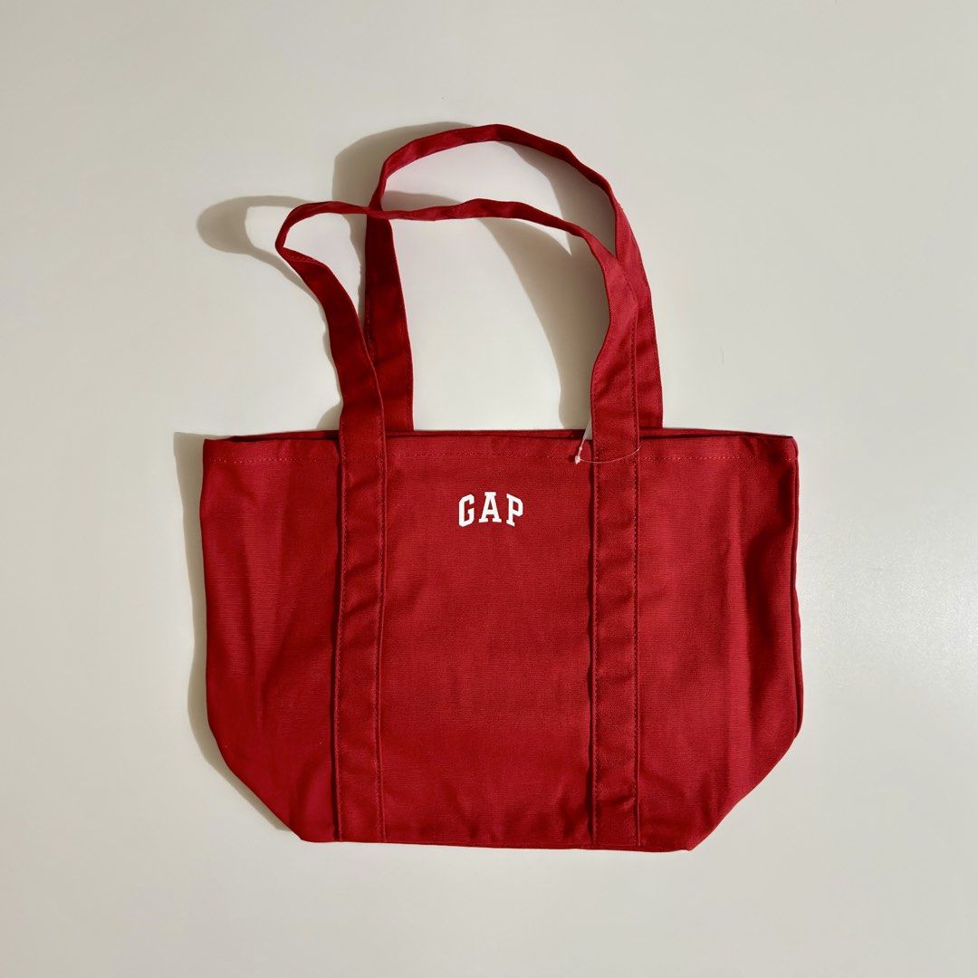 GAP Logo Tote Bags (Category: Tote Bags) located in General Trias. Submitted by upperlaneph (Listing ID 1463135310, Image 1). Description: Mini GAP Logo Tote Bags Dimension (inches): 10” H × 6” W × 10” L Price: ₱1,500 each Available Colorways: • Spring Yellow • Off-White • Algae Green • Summer Purple Plum • Modern Red ✅ 100% Brand New & Authentic (Bought from Canada) We offer same-day delivery via Lalamove and nationwide shipping via J&T and LBC.