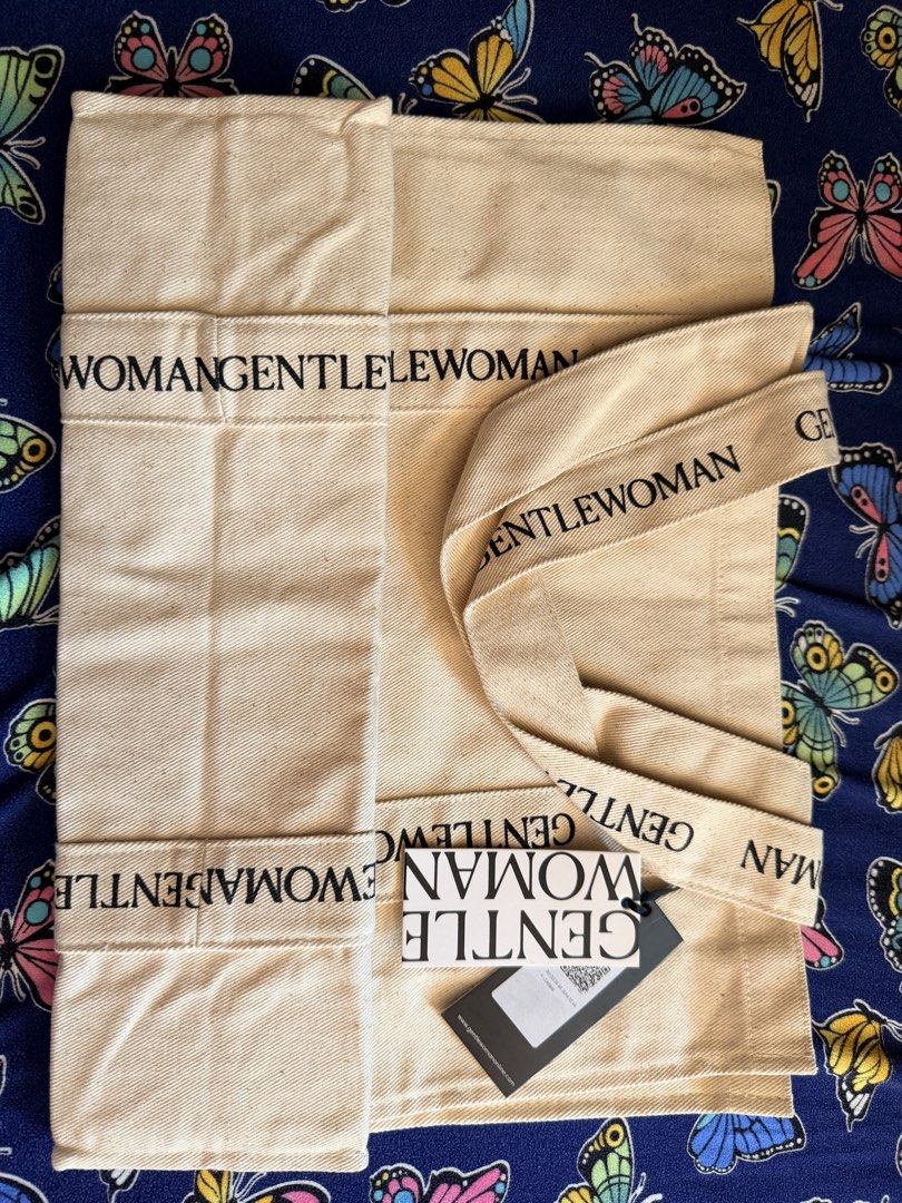Gentlewoman Tote Bag (Category: Tote Bags) located in Cavite. Submitted by rhodamatu52207 (Listing ID 1463164378, Image 1). Description: - Gentlewoman canvas tote bag - Features brand name printed on straps and bag - Comes with original tag - Ideal for everyday use.